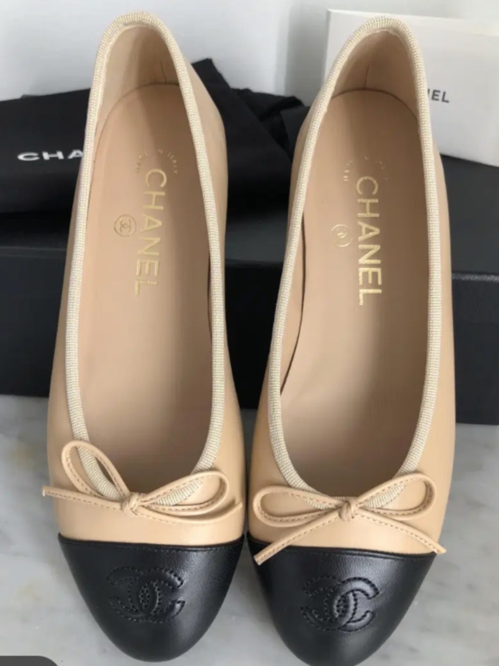 CHANEL Beige and Black Leather Cap-Toe Ballet Flats